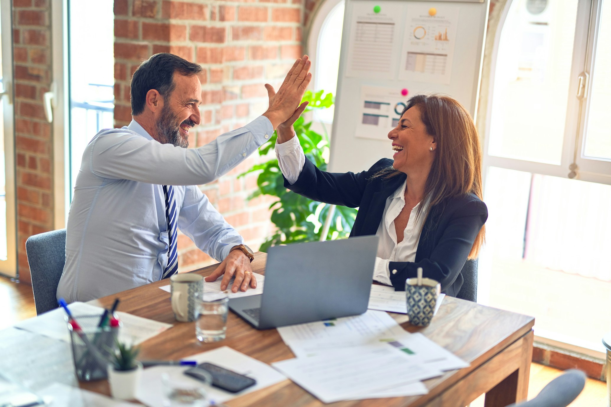 Home service business owner meeting with a True North business coach